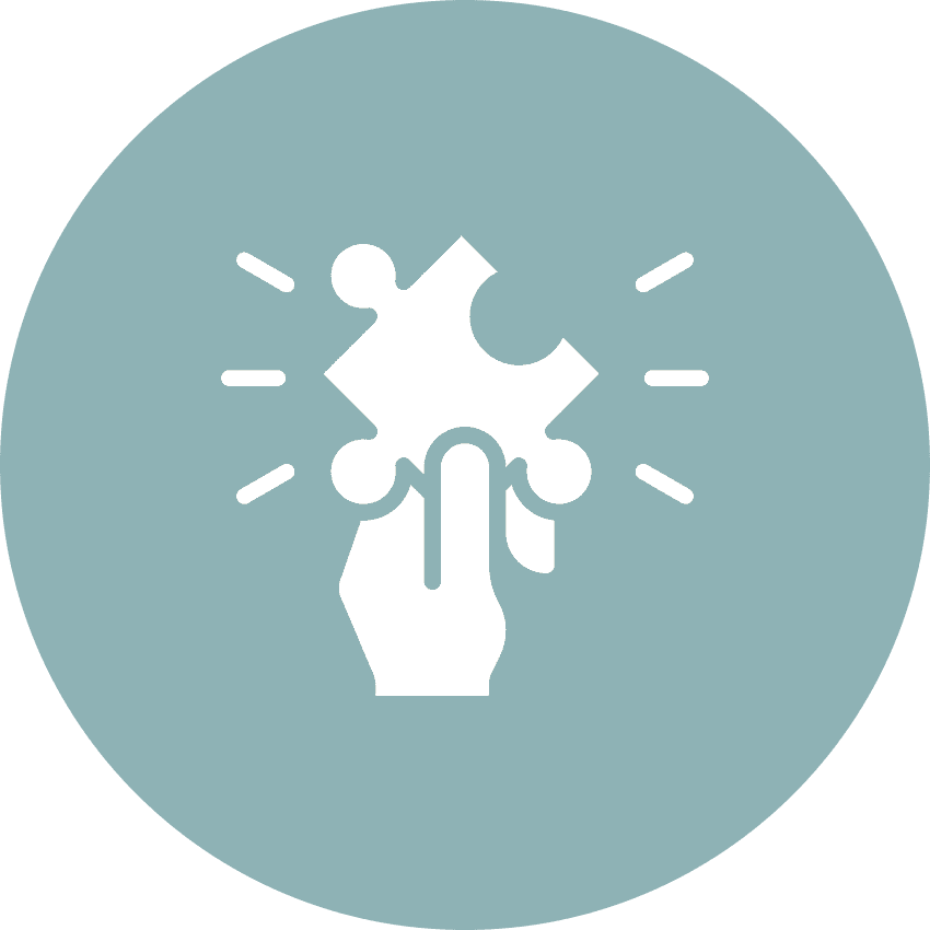 Hand holding a puzzle piece symbolizing problem solving.